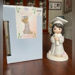 Precious moments graduation figurine.  Beautiful condition! In box!